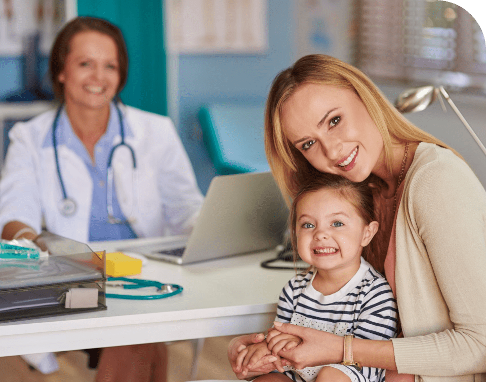 Woman at a doctors' with a child