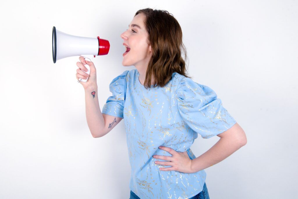 Woman holding a megaphone