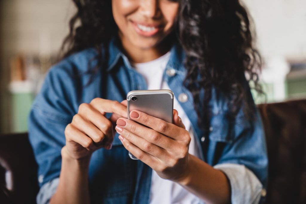 young woman using phone